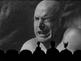 A scene from THE AMAZING COLOSSAL MAN on MST3K in which he deals with constipation on the 40 ft scale.